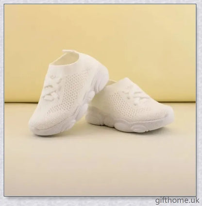 Soft-soled toddler shoes for boys and girls featuring a grid pattern design and non-slip sole for comfort and safety
