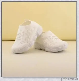 Soft-soled toddler shoes for boys and girls featuring a grid pattern design and non-slip sole for comfort and safety