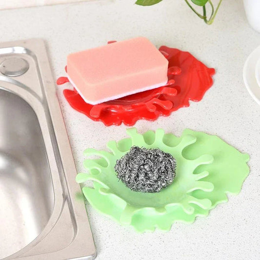 Eco-friendly blood-shaped plastic rest for kitchen tools, designed to hold various cooking utensils and add a touch of quirky charm to your cooking space