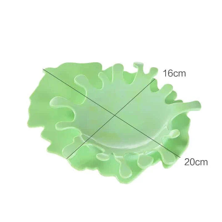 Eco-friendly blood-shaped plastic rest for kitchen tools, designed to hold various cooking utensils and add a touch of quirky charm to your cooking space