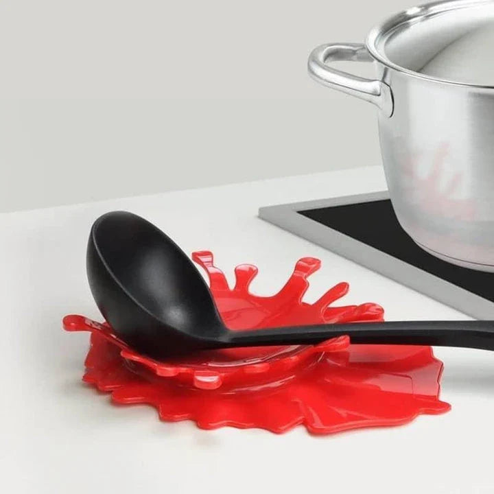 Eco-friendly blood-shaped plastic rest for kitchen tools, designed to hold various cooking utensils and add a touch of quirky charm to your cooking space
