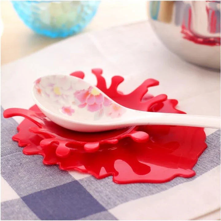 Eco-friendly blood-shaped plastic rest for kitchen tools, designed to hold various cooking utensils and add a touch of quirky charm to your cooking space
