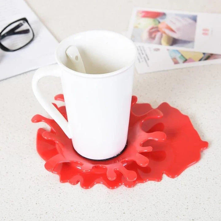 Eco-friendly blood-shaped plastic rest for kitchen tools, designed to hold various cooking utensils and add a touch of quirky charm to your cooking space