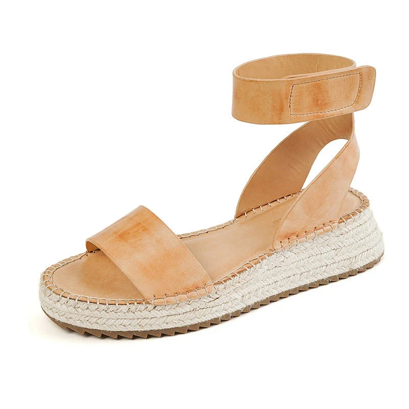 Chic leather platform sandals in yellow with a secure buckle strap and open side vamp design