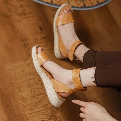 Chic leather platform sandals in yellow with a secure buckle strap and open side vamp design
