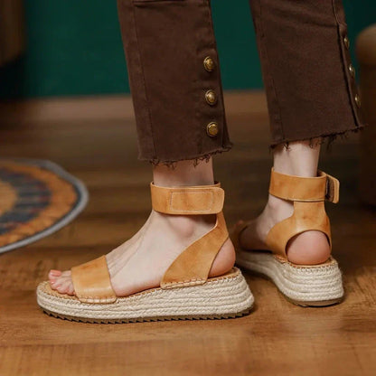 Chic leather platform sandals in yellow with a secure buckle strap and open side vamp design