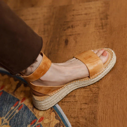 Chic leather platform sandals in yellow with a secure buckle strap and open side vamp design