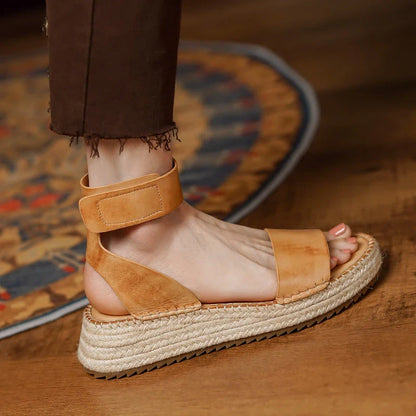 Chic leather platform sandals in yellow with a secure buckle strap and open side vamp design