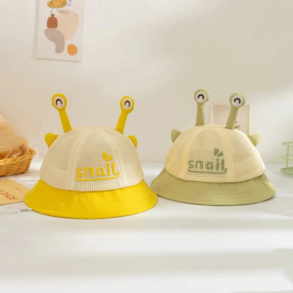 A blue cotton baby bucket hat with a solid colour design to protect your child from harmful UV rays.