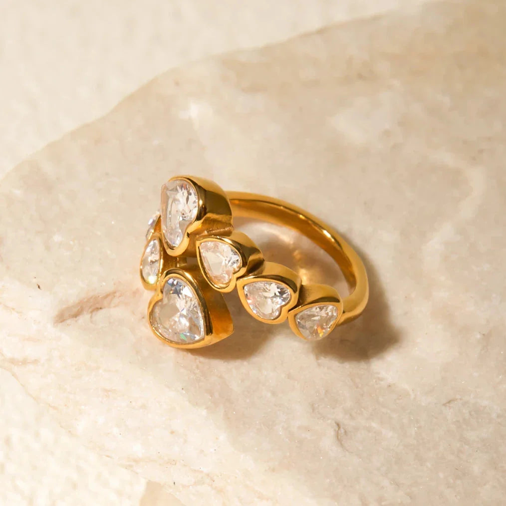 18K gold-plated cubic zirconia heart-shaped interlaced ring with a sparkling centerpiece and intricate detailing