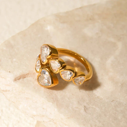 18K gold-plated cubic zirconia heart-shaped interlaced ring with a sparkling centerpiece and intricate detailing