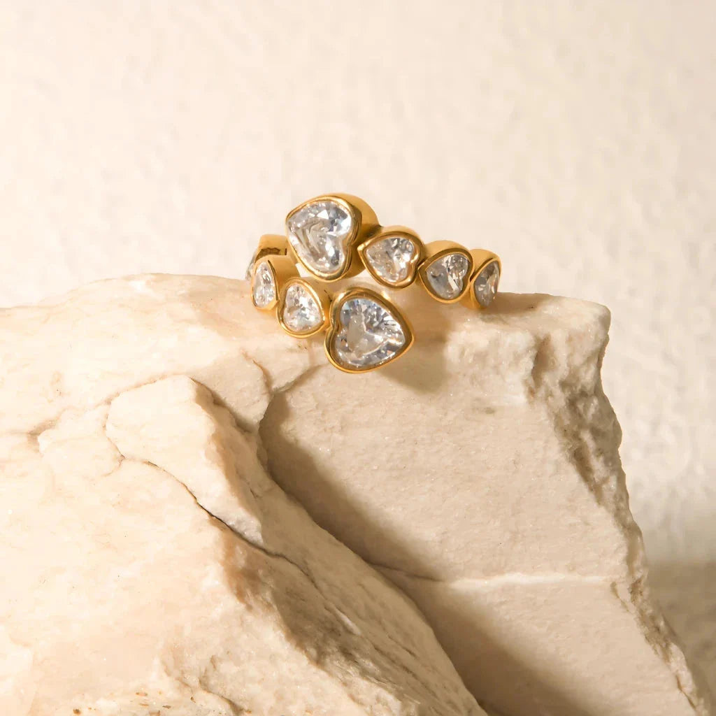 18K gold-plated cubic zirconia heart-shaped interlaced ring with a sparkling centerpiece and intricate detailing