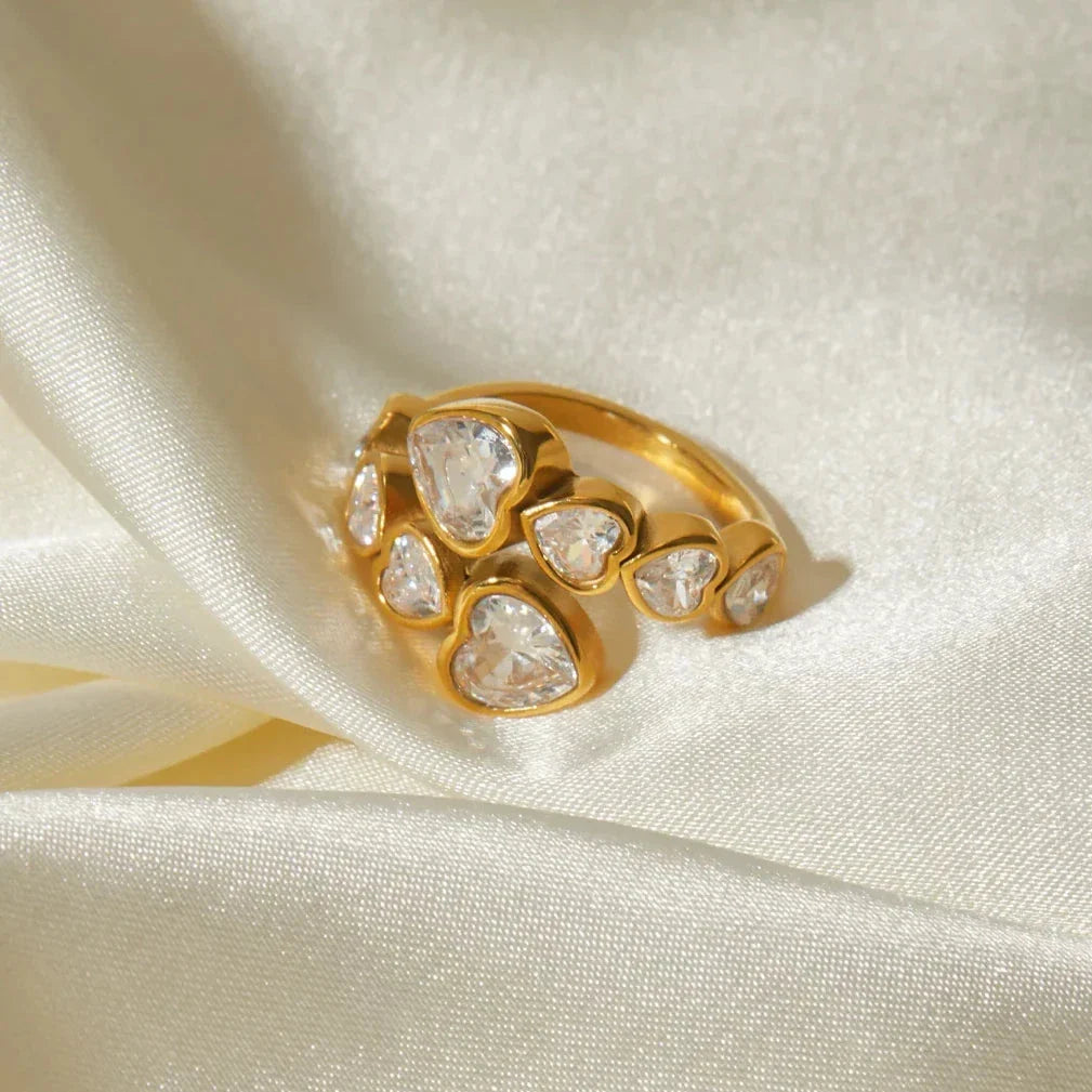 18K gold-plated cubic zirconia heart-shaped interlaced ring with a sparkling centerpiece and intricate detailing
