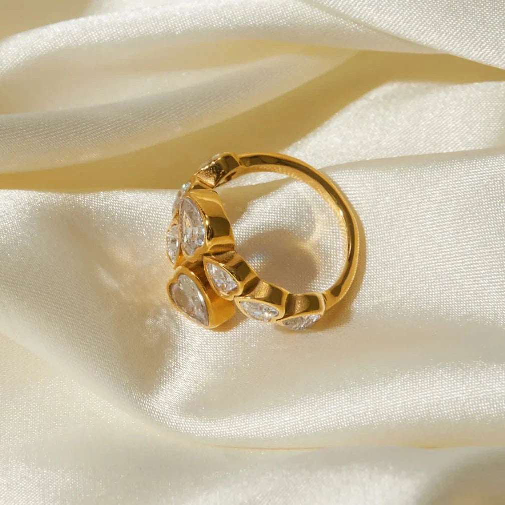 18K gold-plated cubic zirconia heart-shaped interlaced ring with a sparkling centerpiece and intricate detailing