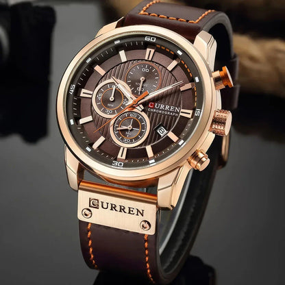A sophisticated men's leather sports chronograph watch with a sleek round design and multiple sub-dials for enhanced functionality.