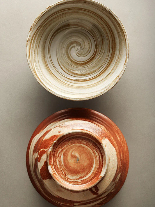 Stylish red ceramic salad bowl with generous capacity for serving a variety of dishes