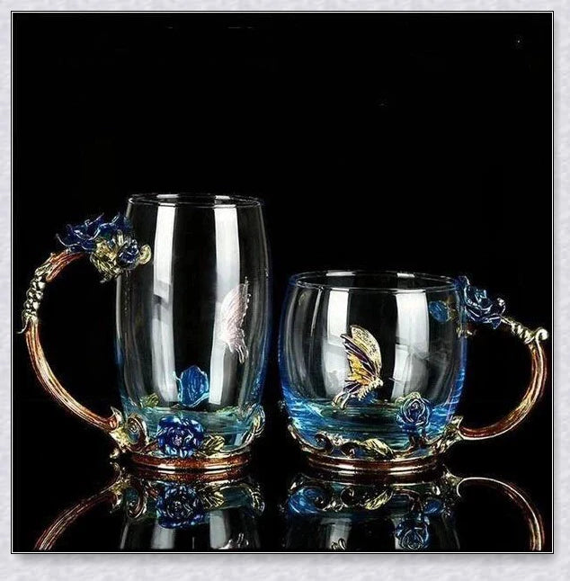 Handmade enamel mug with butterfly and rose designs, complete with golden trimming
