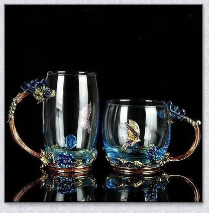 Handmade enamel mug with butterfly and rose designs, complete with golden trimming