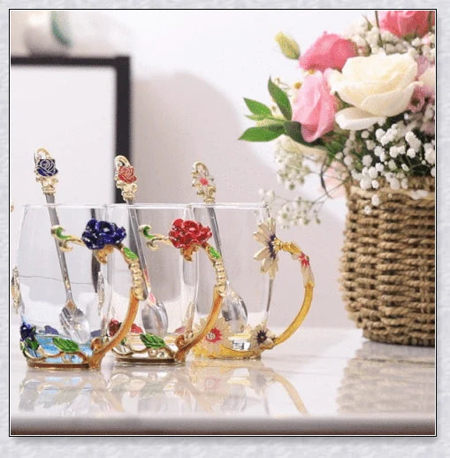 Handmade enamel mug with butterfly and rose designs, complete with golden trimming