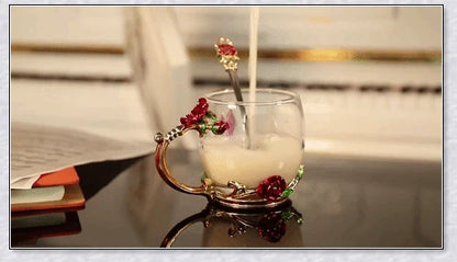 Handmade enamel mug with butterfly and rose designs, complete with golden trimming
