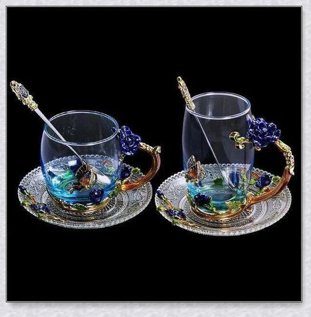 Handmade enamel mug with butterfly and rose designs, complete with golden trimming