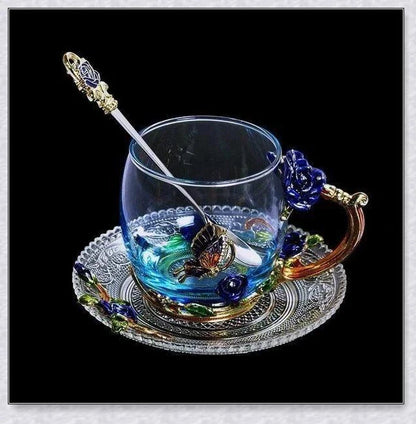 Handmade enamel mug with butterfly and rose designs, complete with golden trimming