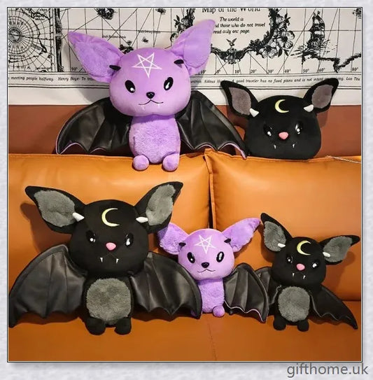 Soft, plush bat toy in purple and black colours, perfect for cuddling or decoration