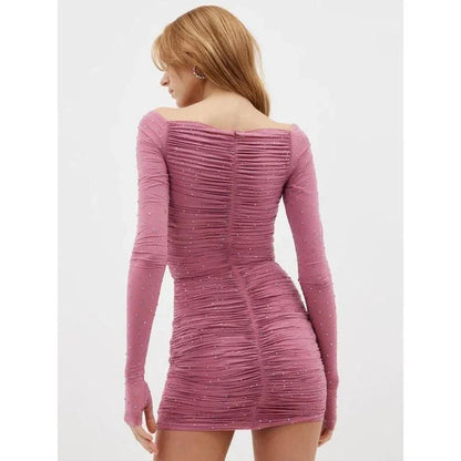 A glittering, hollow-out mini dress with a strapless neckline and figure-flattering silhouette, perfect for special occasions.