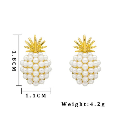 Elegant pearl pineapple stud earrings for women in a white and gold colour scheme