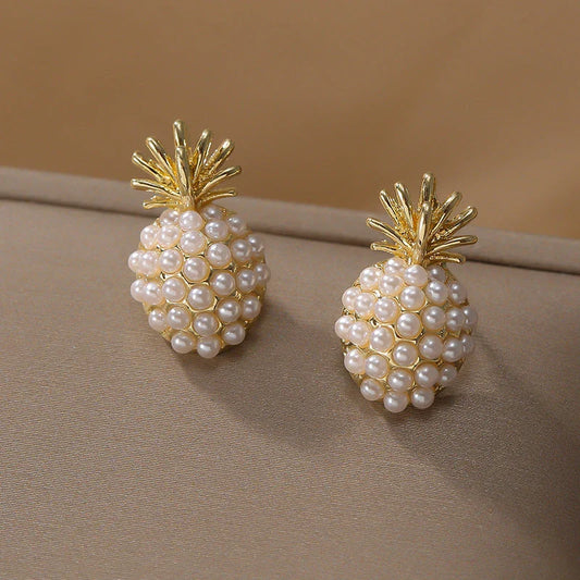 Elegant pearl pineapple stud earrings for women in a white and gold colour scheme