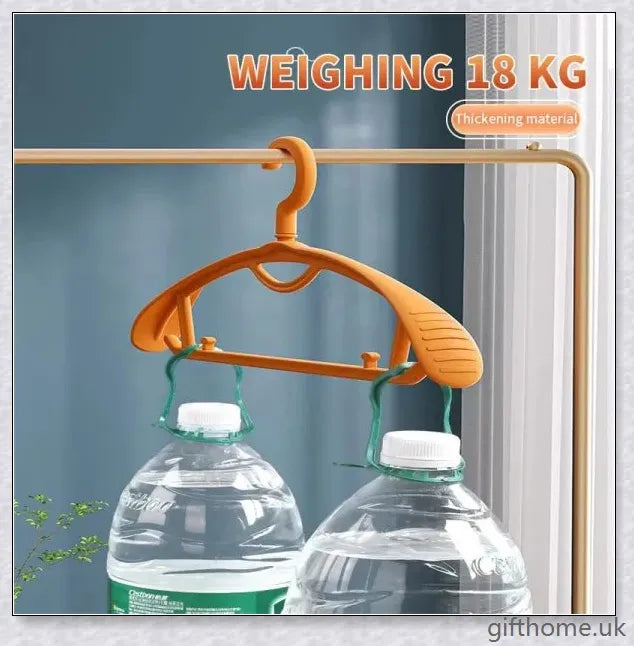 A set of 5 modern, non-slip clothes hangers in black, white, and grey colours, designed to keep your wardrobe organized and wrinkle-free.
