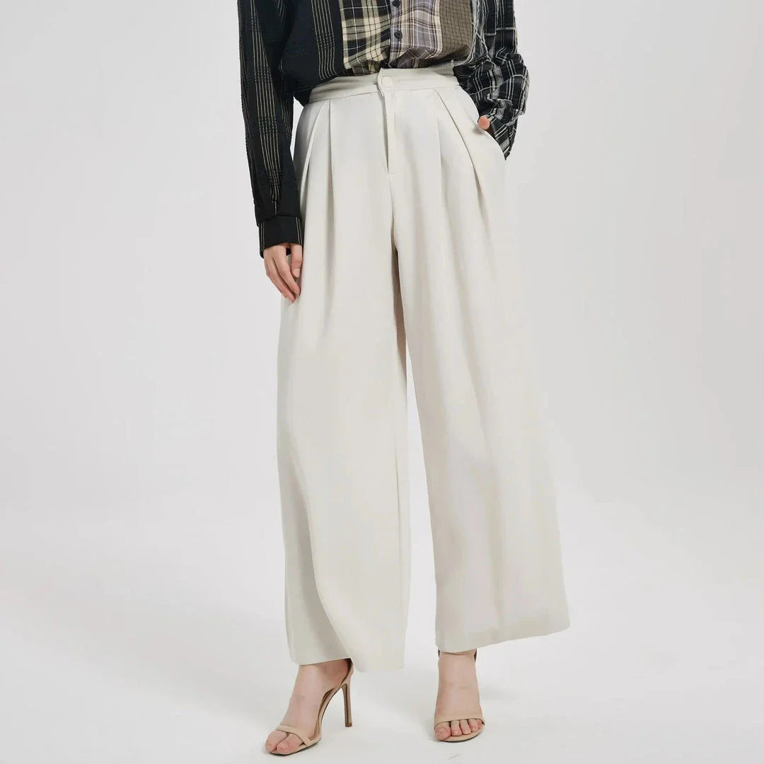 Elegant high-waist wide leg trousers for women in beige, designed for a flattering and comfortable fit.