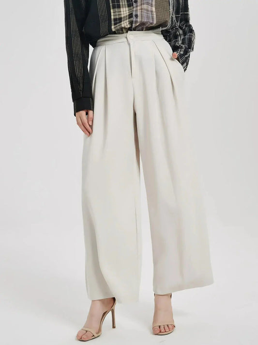 Elegant high-waist wide leg trousers for women in beige, designed for a flattering and comfortable fit.