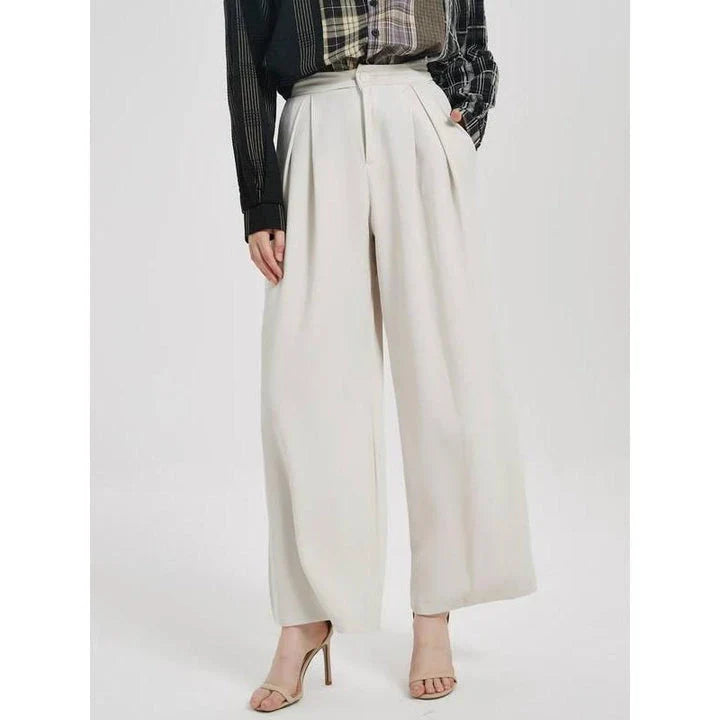 Elegant high-waist wide leg trousers for women in beige, designed for a flattering and comfortable fit.