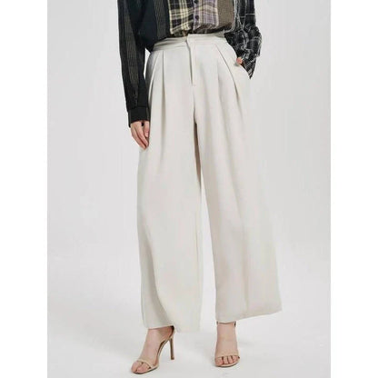 Elegant high-waist wide leg trousers for women in beige, designed for a flattering and comfortable fit.