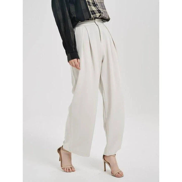 Elegant high-waist wide leg trousers for women in beige, designed for a flattering and comfortable fit.