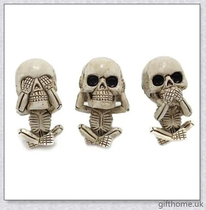 A set of three handcrafted resin skulls with a unique, captivating design that adds an intriguing touch to any space and helps purify the air.