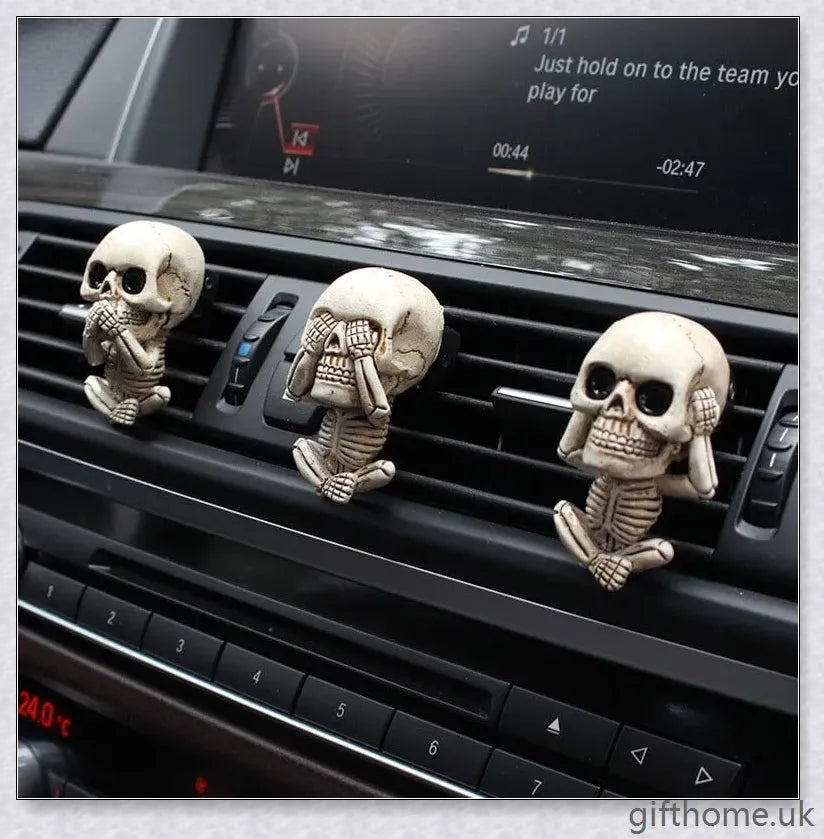 A set of three handcrafted resin skulls with a unique, captivating design that adds an intriguing touch to any space and helps purify the air.