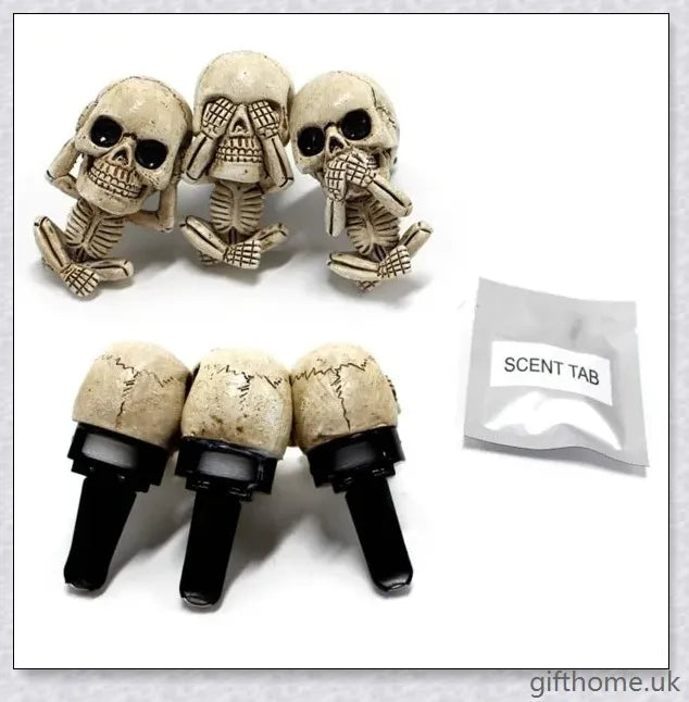 A set of three handcrafted resin skulls with a unique, captivating design that adds an intriguing touch to any space and helps purify the air.
