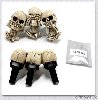 A set of three handcrafted resin skulls with a unique, captivating design that adds an intriguing touch to any space and helps purify the air.