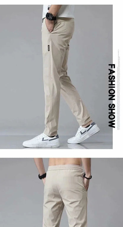 Premium Korean-style drawstring trousers in black, khaki, and dark grey colours, featuring a relaxed, straight-leg silhouette and micro-elastic fabric for comfort and flexibility.