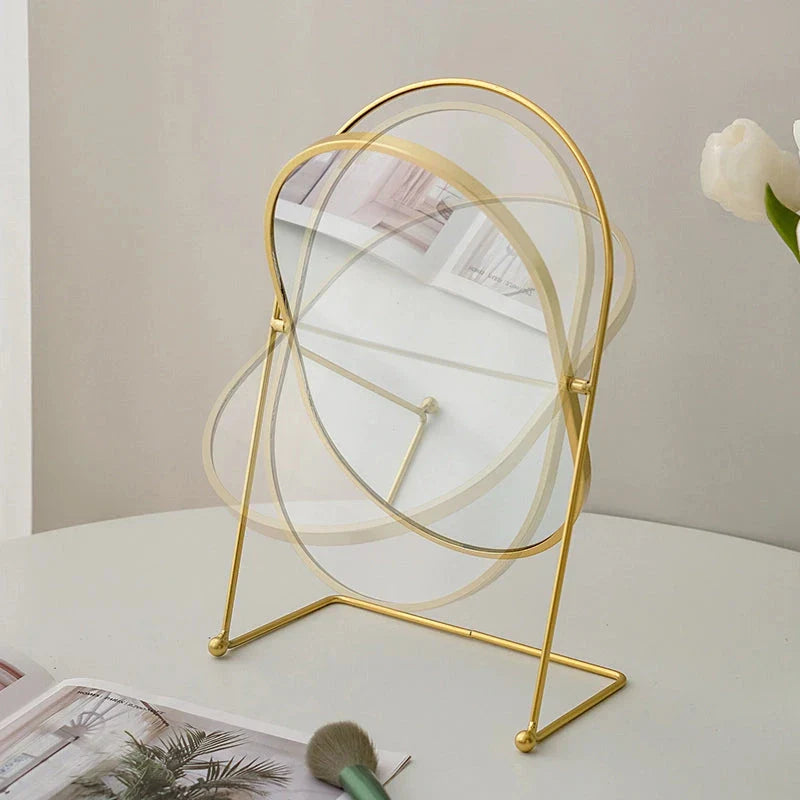 A large, minimalist desktop makeup mirror with a sleek black frame and a spacious viewing area for detailed grooming and makeup application.