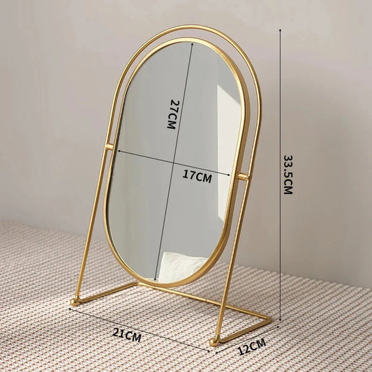 A large, minimalist desktop makeup mirror with a sleek black frame and a spacious viewing area for detailed grooming and makeup application.