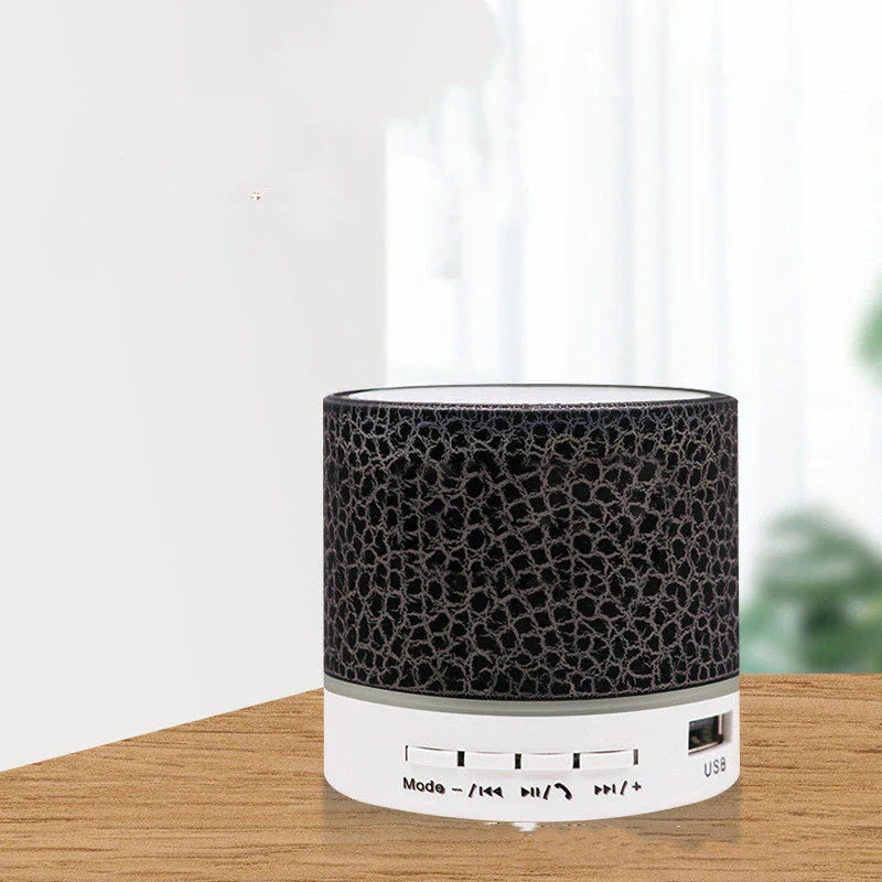 Portable Bluetooth speaker with colorful changing lights, high-quality audio, and durable design for on-the-go use