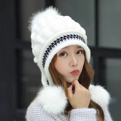 Knit fleece beanie with ear flaps and pompom in various colours for winter warmth