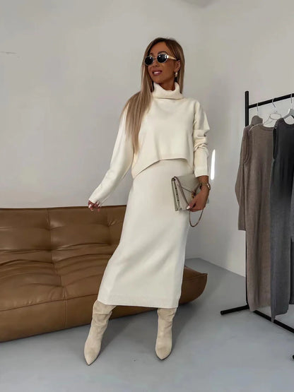 Women's winter turtleneck pullover and sleeveless long dress set in white, grey, and camel