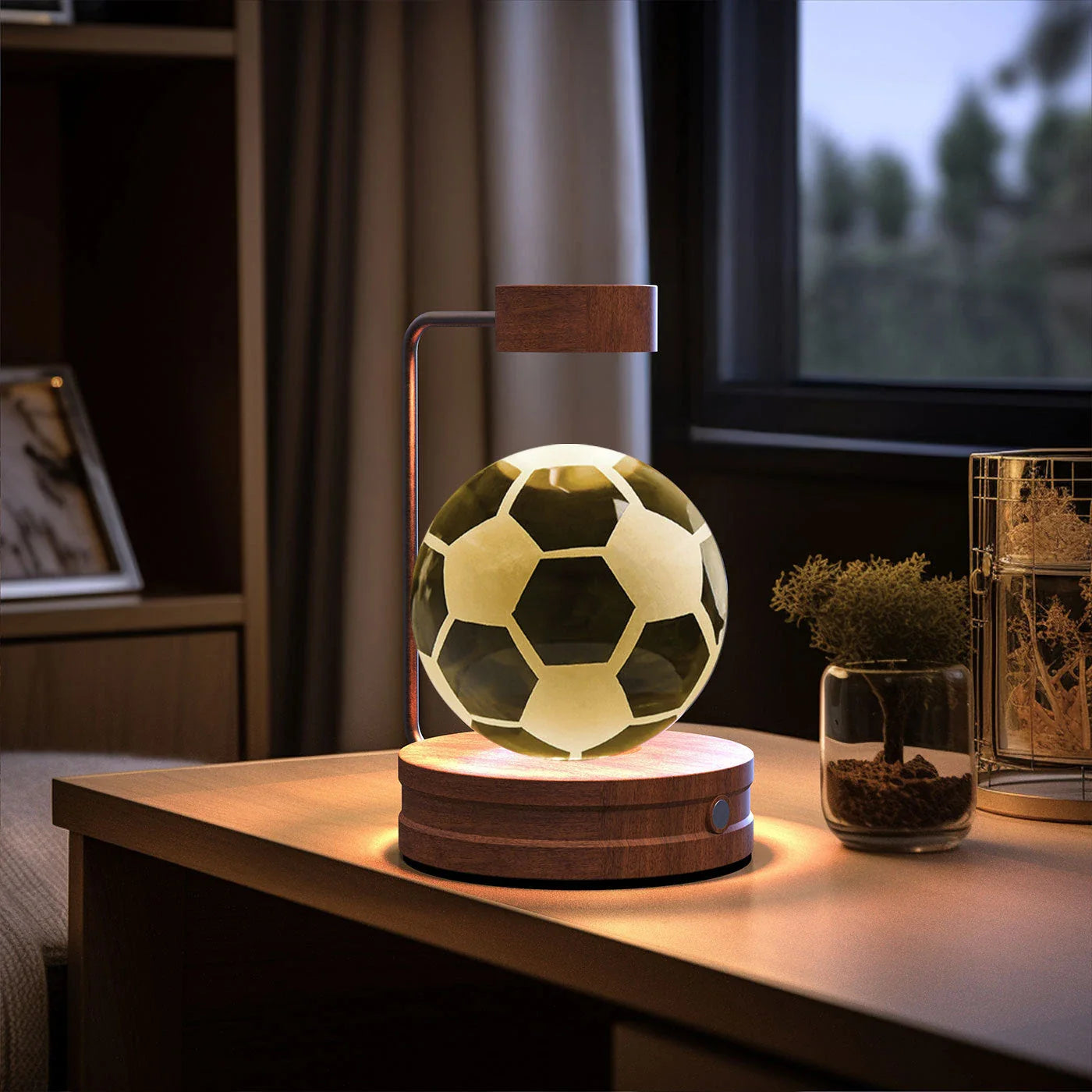 Enchanting crystal ball night light with cosmic designs, creating a warm and soothing ambiance in any room.
