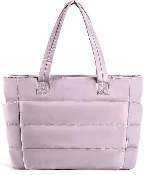 Premium cotton handbag with spacious design, secure zip-top closure, and thoughtful interior organisation for daily use
