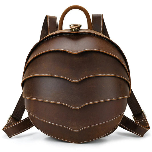 Vintage leather backpack in dark brown and black with multiple pockets