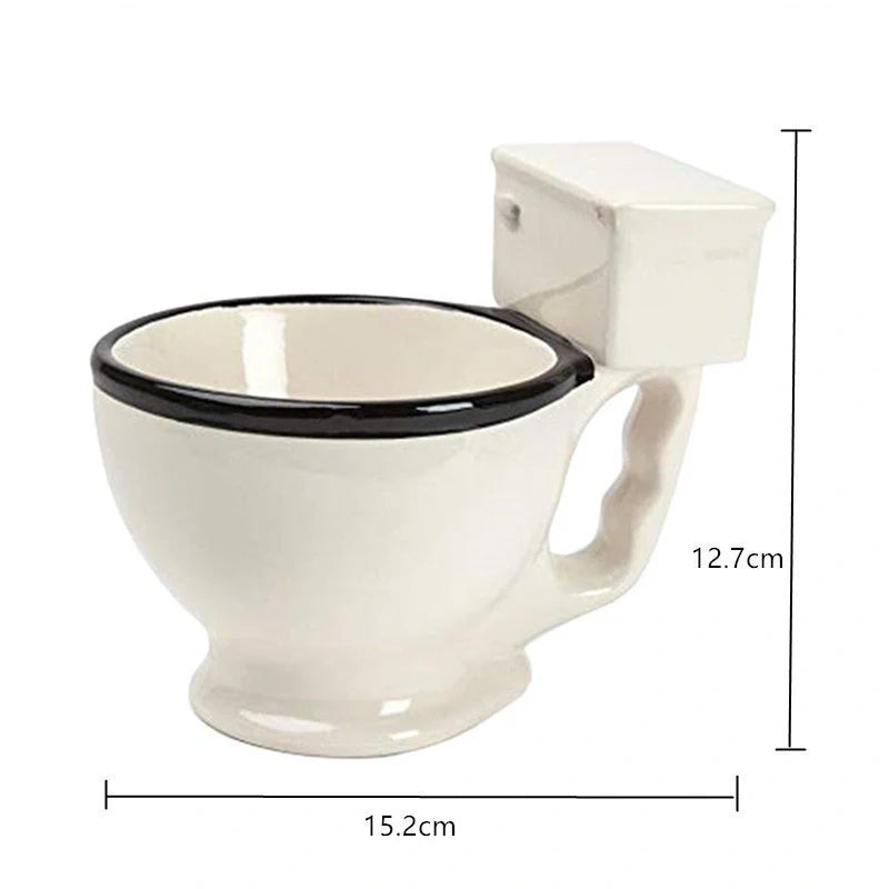 Toilet-shaped ceramic mug with handgrip, perfect for coffee or tea, holding 280ml.